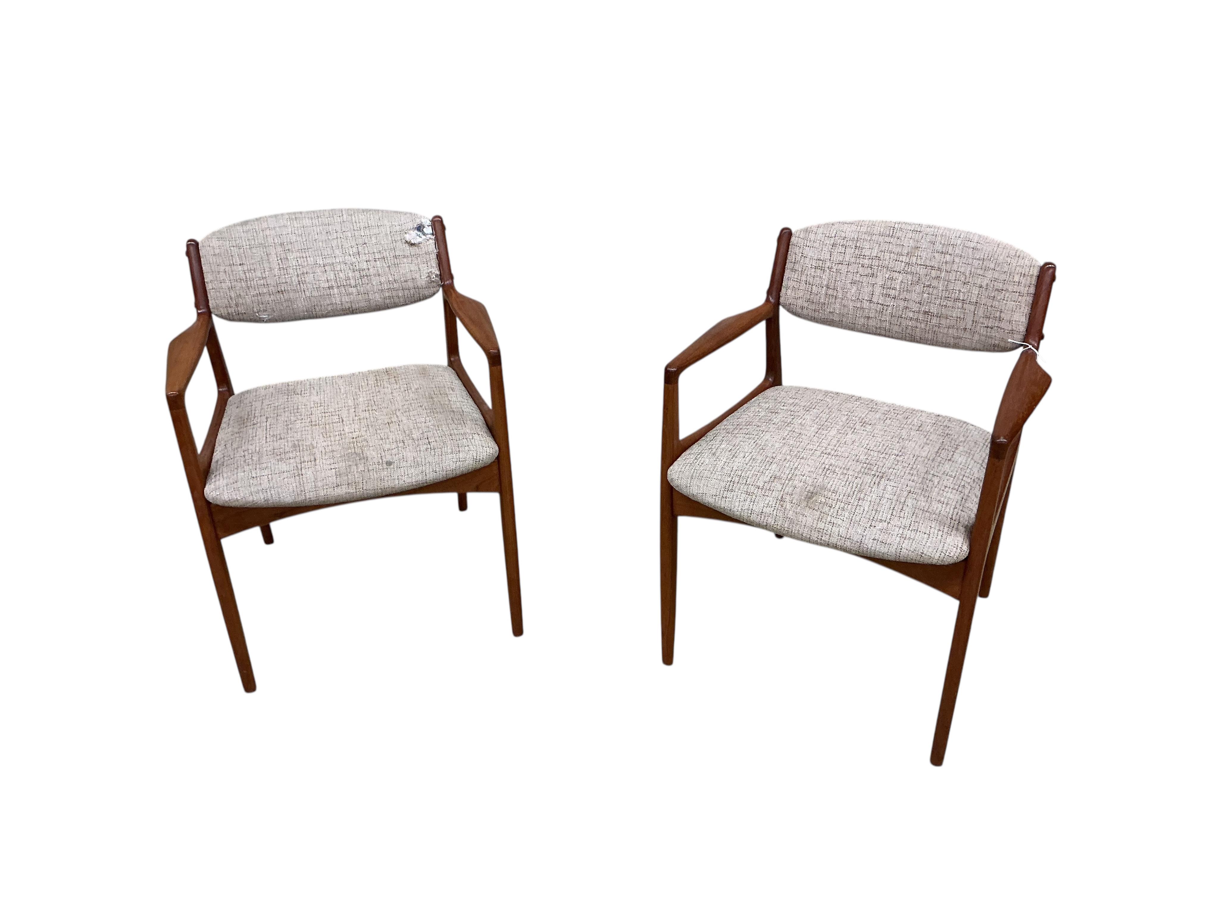 A pair of Eric Buck chairs, width 60cm, depth 50cm, height 72cm